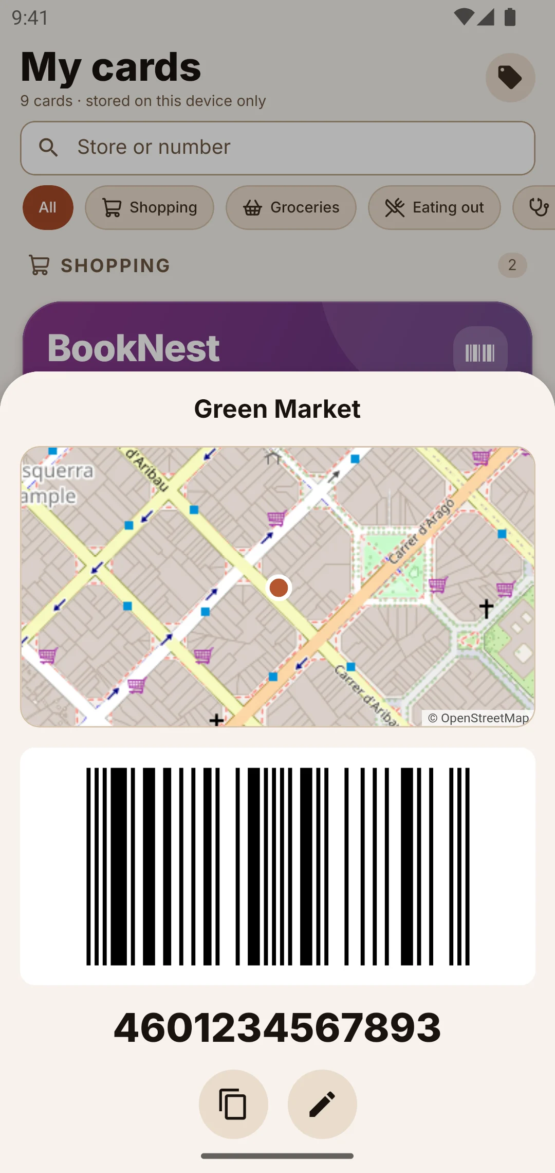A card sheet showing a large barcode and a map of the shop